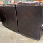 Chocolate Manual Reclining Roll Arm Sofa w/ Nailhead Trim